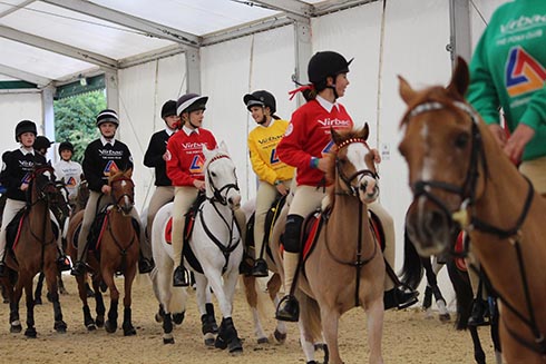 The mounted games teams in the collecting ring