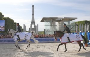 Karim Elzoghby on Amelia and Ben Maher on Cella parade after winning deah heat the Prix de la Ville de Paris