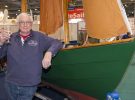 Stewart Brown celebrates the past and maps out the future of Drascombe as they celebrate 50 years of business at the the London Boat Show 2017. Credit: onEdition