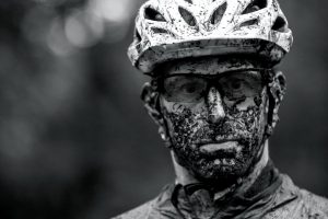 mountain biker with muddy face