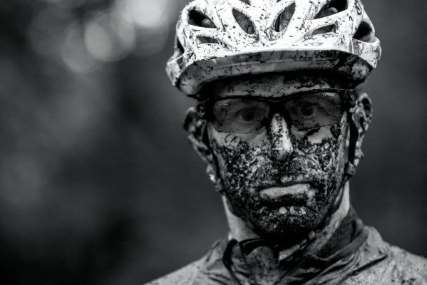 mountain biker with muddy face