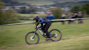 Innes Graham racing a mountain bike at the EWS Tweed Valley event