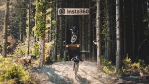 Going off a jump on the new FlowState track at Dyfi Bike Park