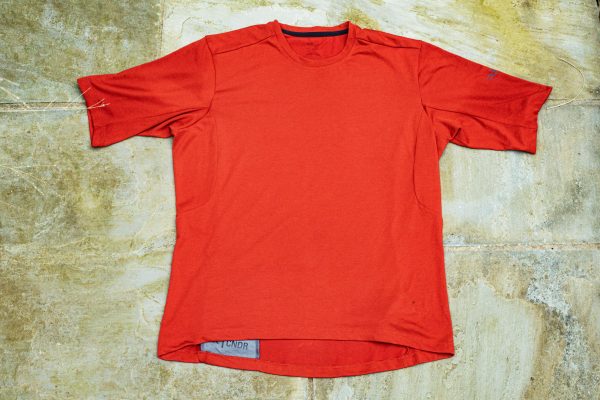 Rab Cinder Crimp mountain bike jersey shot outdoors