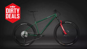 The Voodoo Loco hardtail MTB side on with MBR deals. logo