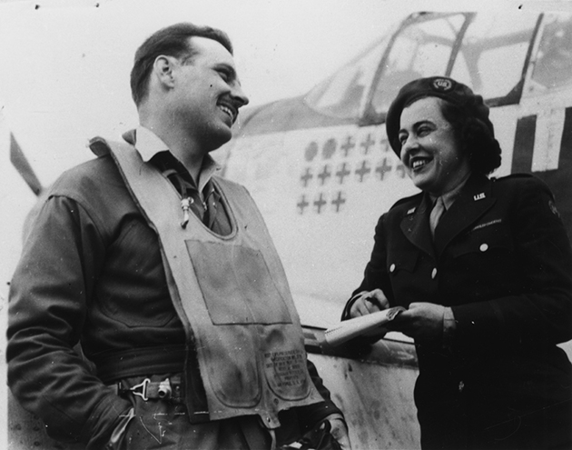 Virginia Irwin (1908–1980), features writer from a Missouri newspaper, interviews Lieutenant Glennon T ‘Bubbles’ Moran of the 352nd Fighter Group at Bodney air base in Norfolk