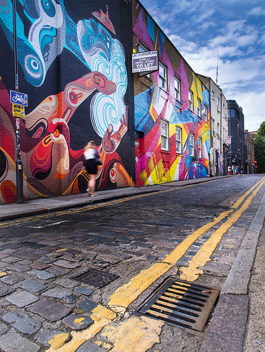 In this shot of Shoreditch, London, crouching down meant filling the foreground with features unique to the urban environment (Olympus Pen E-P5, 12mm, 1/125sec at f/8, ISO 200, 0.9 ND soft grad)