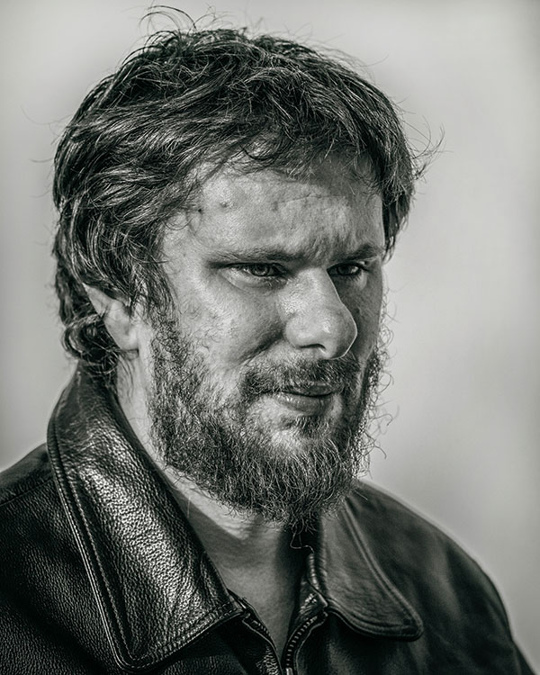 After: The original image was too bright. Portraits should be shot 1 stop darker than the camera recommends