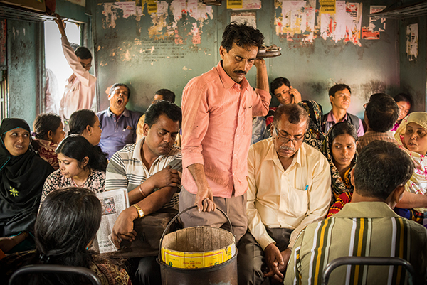 Selling food on the suburban train in Kolkata