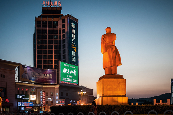 China borders North Korea on the Yalu River. In the city of Dandong, China, (pictured here) visitors who cannot obtain a visa can jump on a boat that sails past the country. For many this is their only taste of the city, particularly South Korean citizens