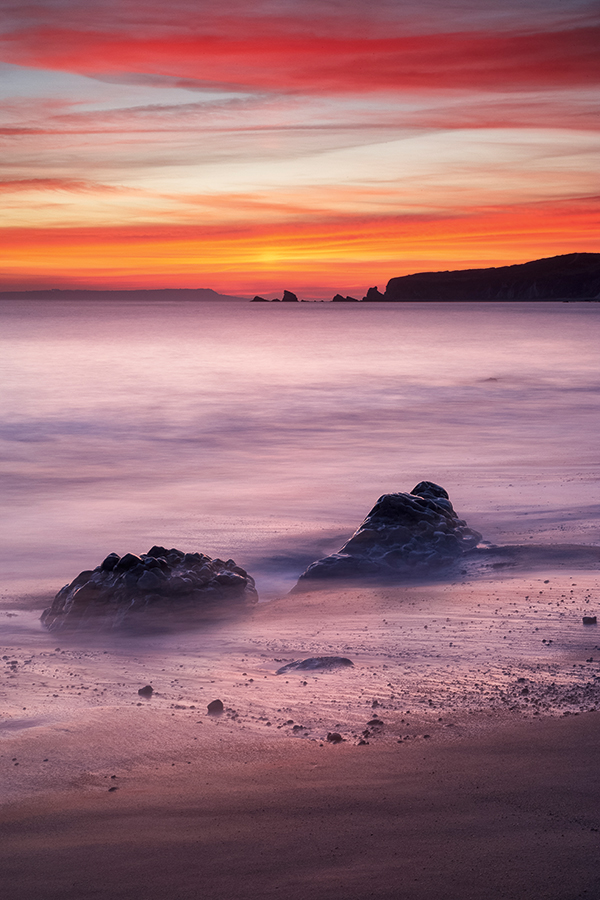 The jagged rock stacks at the western end offer great foreground interest