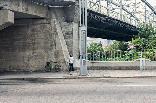 A North Korean citizen makes a quick stop
