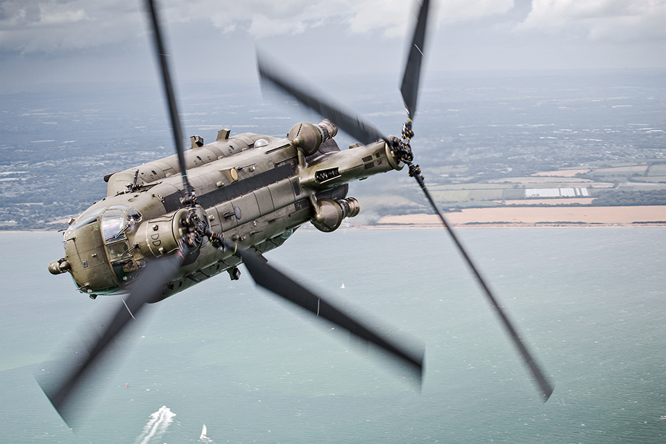 2015-07-22. The Solent, Southern England, United Kingdom. Pictured: A 27 Sqn Chinook makes a hard bank over The Solent during a Aircraft Handling Exercise to assess the development of new Pilots and Aircrew. As part of a 2-day Training Exercise, 27 Sqn, based out of RAF Odiham flew several sorties over Southern England and the Channel to assess the handling standards and flying abilities of their Aircrew and Pilots. Operating the Mk4 Chinook, the crews participated in several scenarios, including confined spaces landing, flying over the sea, low level flight and underslung loads. These sorties incorporated formation flying, which enabled Service air-to-air photography and experience flights for station personnel. SAC Nicholas Egan is an RAF Photographer currently based out of RAF Odiham, Hampshire. He joined the Royal Air Force in 2011, and following his time at the Defence School Of Photography at Cosford, was posted to Aldergrove Flying Station in Northern Ireland. Following his two years spent in Northern Ireland, he was posted to RAF Odiham in January 2015. Photographers details: SAC Nicholas Egan. Photographic Section | RAF Odiham | Hook | Hampshire | RG29 1QT 01256 367289 |