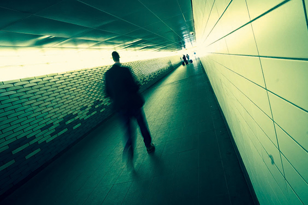 Shooting at 1/8sec has blurred the movement of the pedestrian but the stabilisation system has helped keep the surroundings sharp