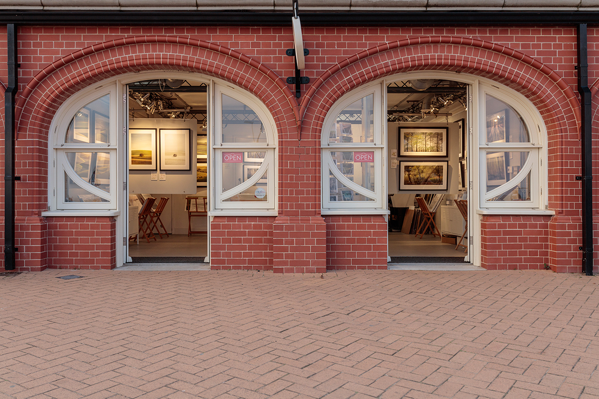 Check out your local galleries, then carefully check the print sales terms and conditions