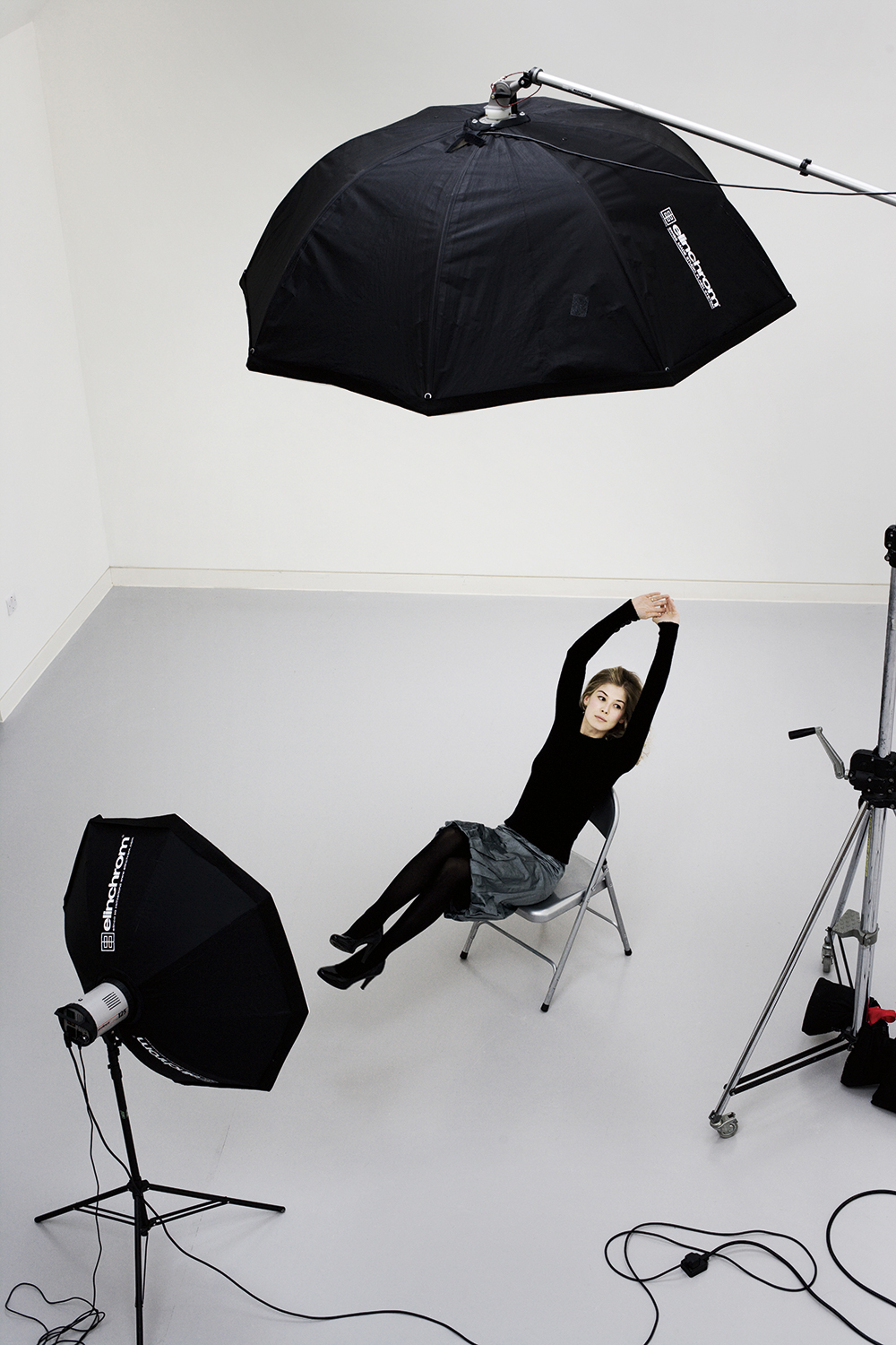 Harry Borden Rosamund Pike with lighting equipment