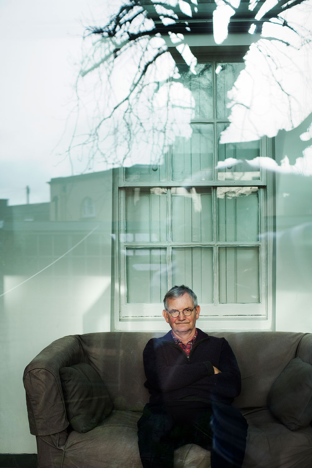 Martin Parr on sofa