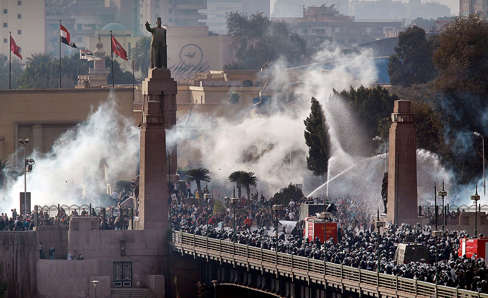 Peter Macdiarmid Riot police and protestors Kasr Al Nil Bridge