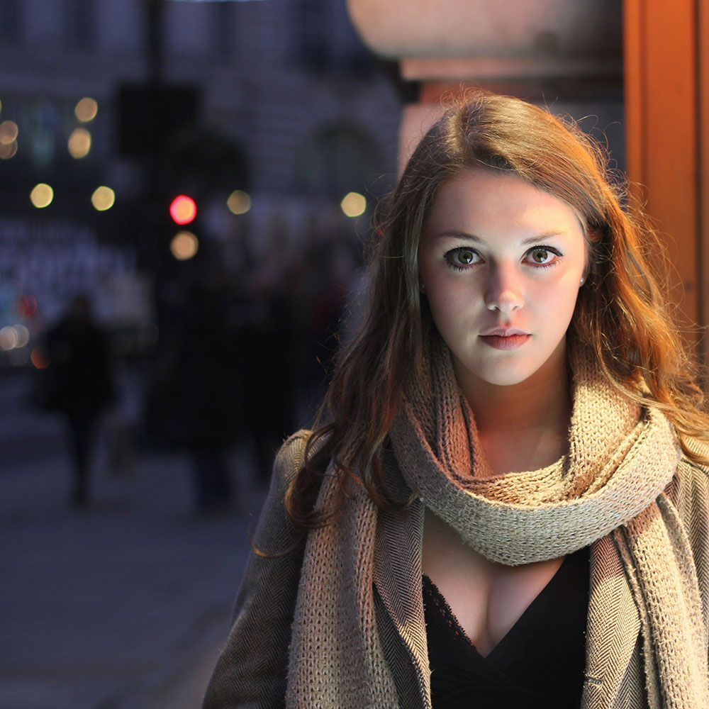 Portraits night light side of shop front