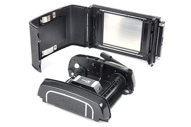 Roll film SLRs Mamiya RB67 inside 120 roll film back