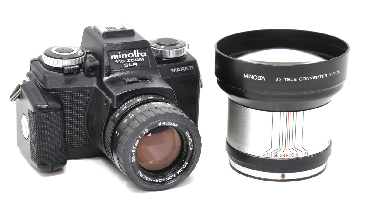 The Minolta 110 Zoom SLR Mark II with its rare teleconverter - 110 film cameras