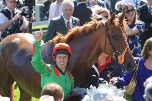 Johnny Murtagh riding Dancing Rain wins the Investec Oaks