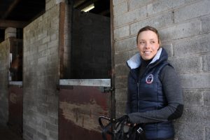 Sophie Wells in the stables