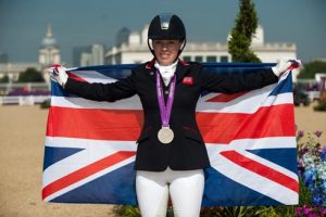 Sophie Wells celebrates her Grade IV silver medal from the individual freestyle at the London 2012 Paralympic Games