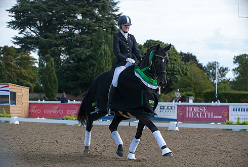 Chloe Vell and Kaja Di Valentina win the Suregrow Advanced Medium Restricted Championship at Espayo National Dressage Championships 2012