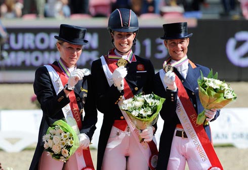 Charlotte Dujardin collects her grand prix special gold medal at the 2013 Europeans