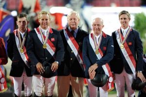 The British team collect their gold medals at the PSI European Showjumping Championships