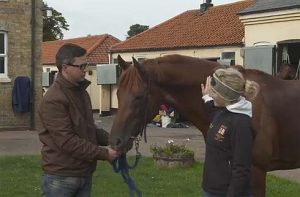 Laura Collett with Aljamaaheer and his trainer Roger Varian