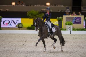 Charlotte Dujardin and Valegro win the grand prix at the Reem Acra FEI World Cup Dressage Final 2014