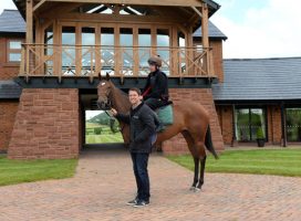 Michael Owen with Destiny's Kitten out side Manor House Stables