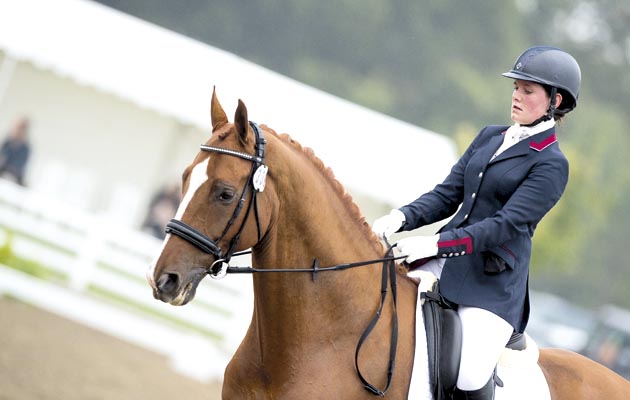 Katie Owens & GDH Skyfall (338) - Dobson & Horrell Novice Restricted Championship - LeMieux National Dressage Championships 2014 - Stoneleigh Park, Warwickshire, United Kingdom - 19/09/2014 © Jon Stroud Media 2014, all rights reserved