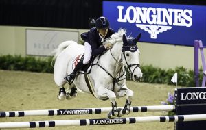 Bertram Allen and Molly Malone take the opening speed leg of the Longines FEI World Cup jumping final 2015 in Las Vegas. Picture by Libby Law Photography