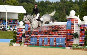 David SIMPSON riding GOTTI VAN PAEMEL; winners of the Equestrian.com Puissance at the at Bolesworth CSI **** International, at Bolesworth Castle, Tattenhall, near Chester on the 19th June 2015