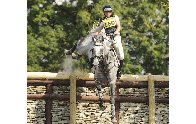 flora harris has a scarry moment while jumping a big wall in the Inermediat champs gatcombe park 8-8-15