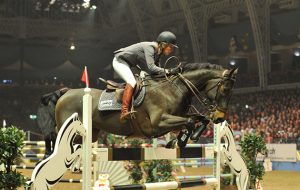 Meredith Michaels-Beerbaum and Checkmate 4 competing at Olympia in 2011.