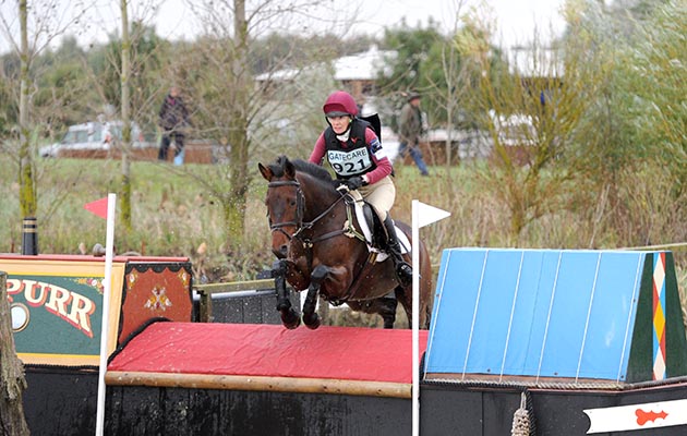 Ellie Crosbie riding SHORT CHANGED in Adv Section S during Little Downham (2) at Ely Eventing Centre, near Ely in Cambridgeshire UK on 6th October 2014