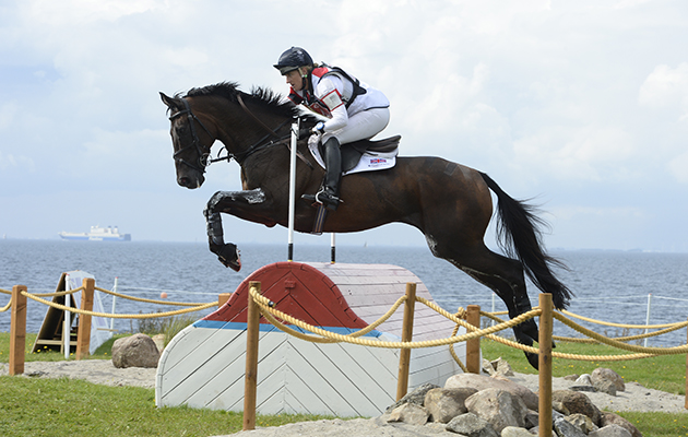 Kristina COOK riding Miners Frolic (GBR) during the cross country phase of the HSBC FEI European Eventing Championship in Malmo Sweden in August 2013