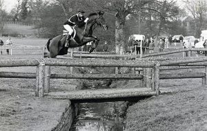 Charisma with Mark Todd over the footbridge at Badminton