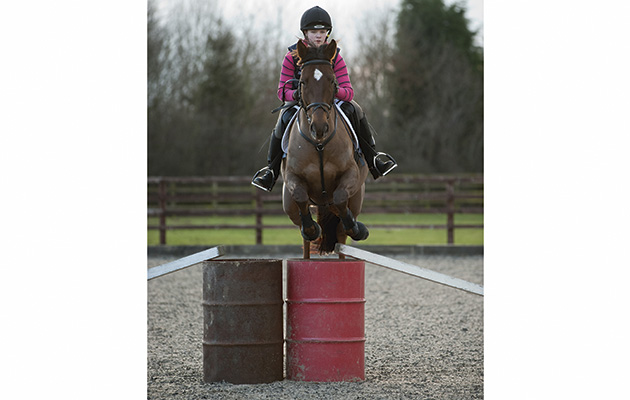 Olivia Deane and Country Lonestar are taught jumping by Yogi Breisner,  Yogi Breisner Masterclass, 28.01.11
