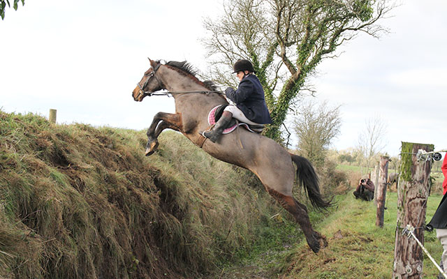 Taking on an Irish bank from a virtual standstill is a totally different way of approaching an obstacle to those who are used to jumping at speed however this formidable bank poses no problems for a Scarteen supporter