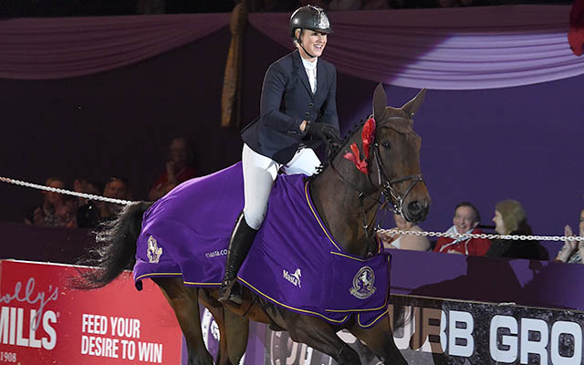 Holly Smith riding QUALITY OLD JOKER, winner of The Thistledown Puissance during HOYS in the NEC in Warwickshire in the UK on 8th October 2016