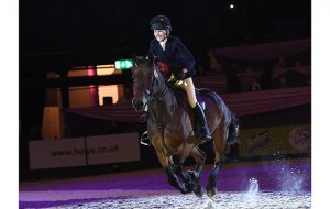 Lucy Eddis riding CASHEL BAY JJ owned by Polly Eddis, Champion in the M&M Working Hunter Pony of the Year Championships during HOYS in the NEC in Warwickshire in the UK on 6th October 2016