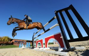 Sir AP McCoy jumping Big Star at Nick Skelton's stables in November 2016.