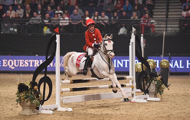 Harriet Birkby and Wilm Vermeir during Class 13 (Mini Major) at the Equestrian.com Liverpool International Horse Show at Echo Arena, Liverpool, UK; on 1st January December 2016