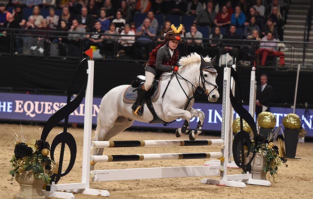 Harry Clarke Tomlinson during of Class 13 (Mini Major) at the Equestrian.com Liverpool International Horse Show at Echo Arena, Liverpool, UK; on 1st January December 2016