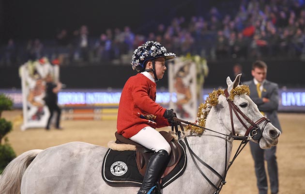 Henry Squibb during of Class 13 (Mini Major) at the Equestrian.com Liverpool International Horse Show at Echo Arena, Liverpool, UK; on 1st January December 2016